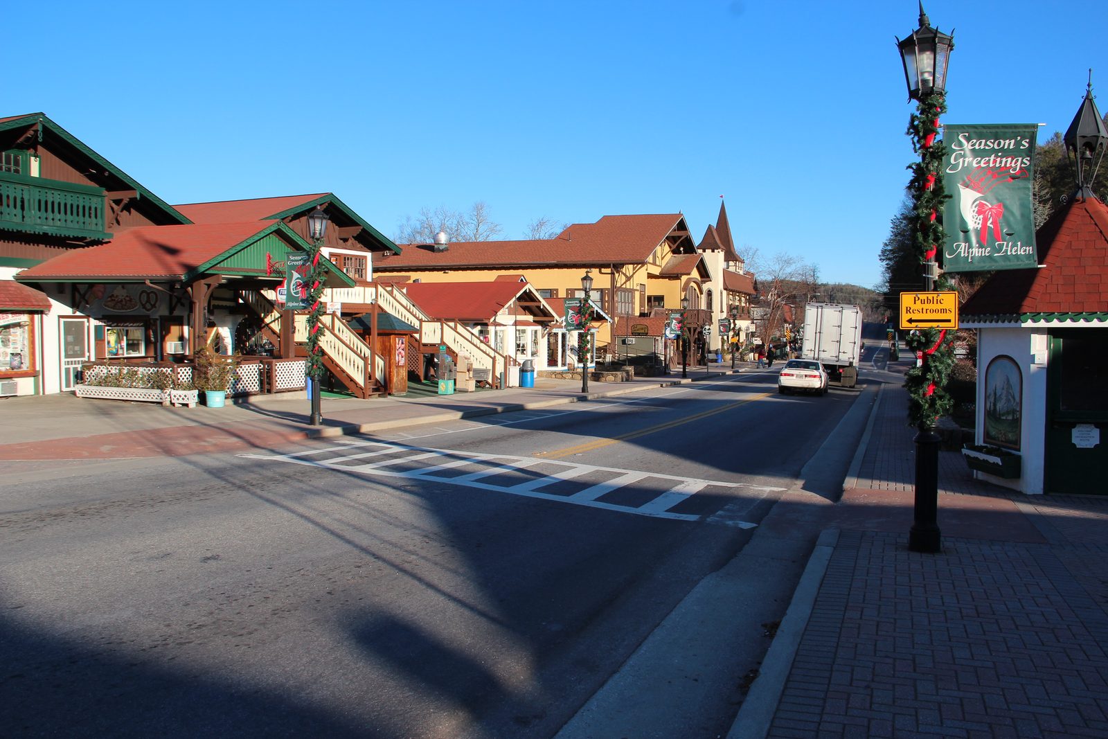 Alpine-style buildings with red roofs and wooden balconies along the main street of Helen, Georgia